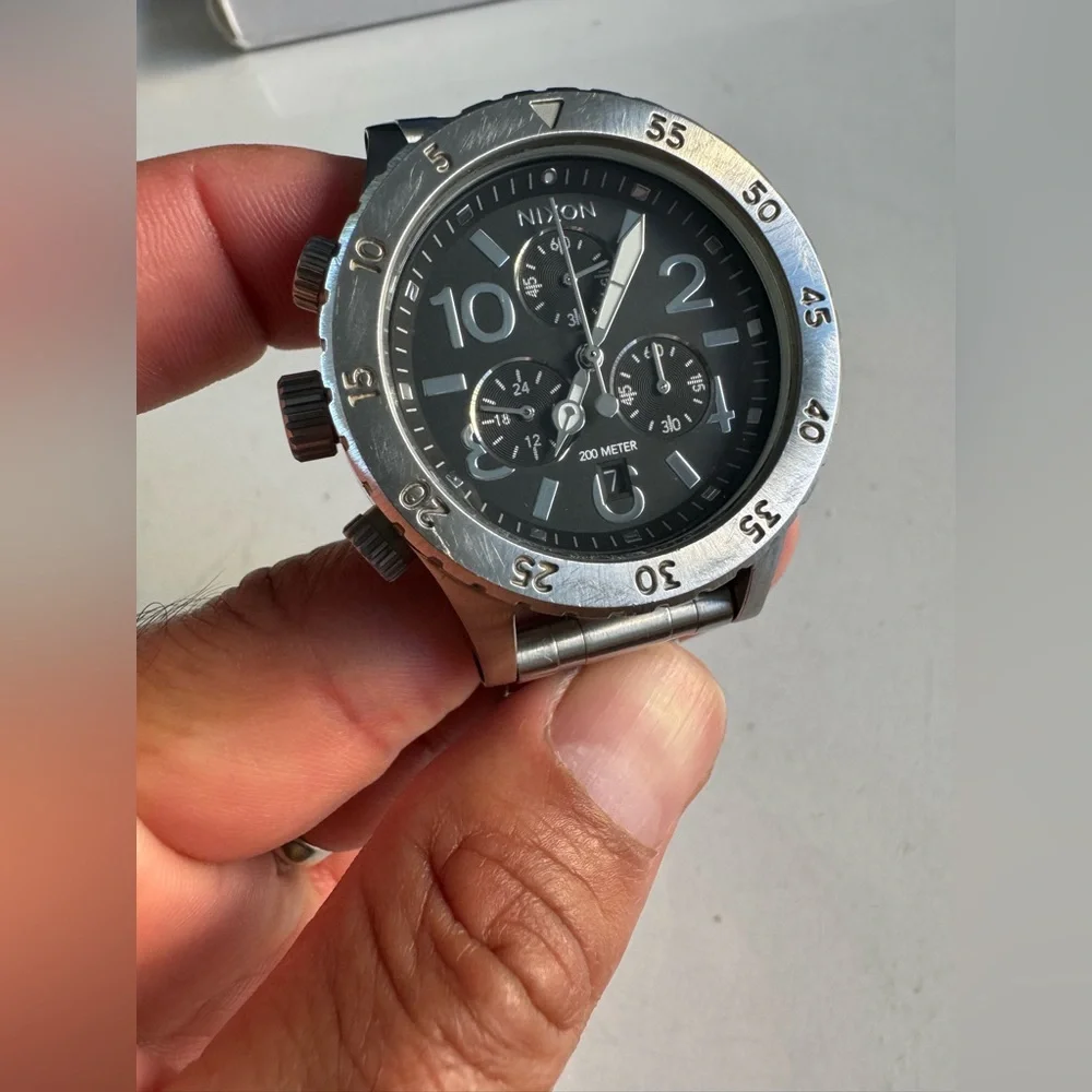 Nixon Men's Silver Stainless Steel Chronograph Watch with Black Dial